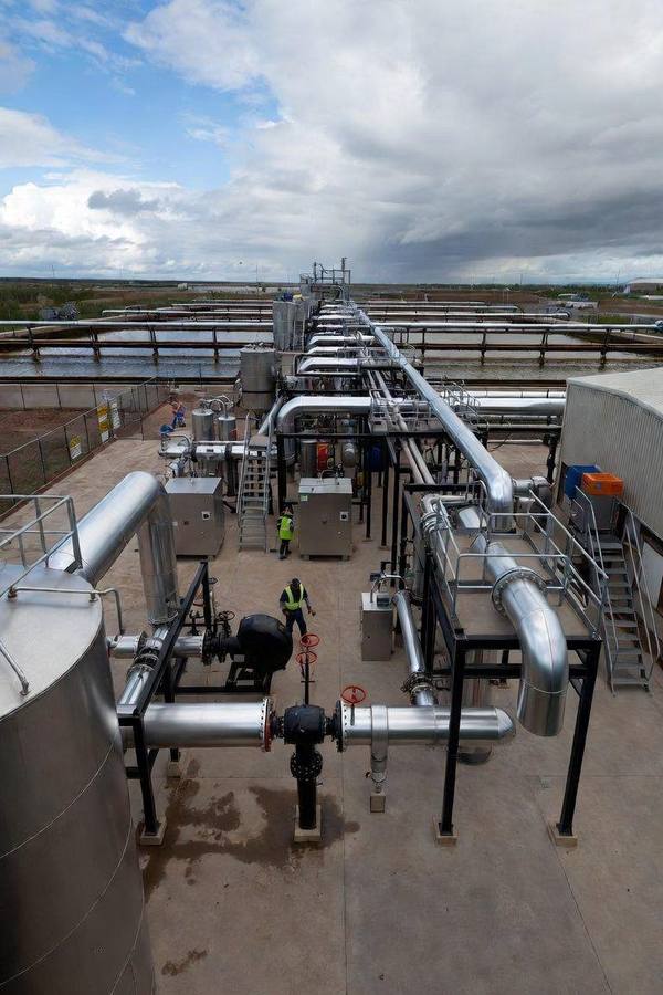 Centrifuge and tailings dewatering equipment at an oil sands facility